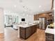 Modern kitchen with island and stainless steel appliances at 135 Armstrong Rd, Belmont, NC 28012