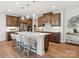Spacious kitchen with an island, stainless steel appliances, and hardwood floors at 135 Armstrong Rd, Belmont, NC 28012