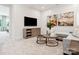Spacious bonus room with a cozy sectional sofa and large TV at 135 Armstrong Rd, Belmont, NC 28012