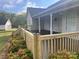 Charming deck with wooden railings and steps at 2116 Cordia Cir, Newton, NC 28658