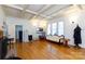 Spacious living room with hardwood floors, coffered ceiling and fireplace at 243 Love St, McConnells, SC 29726