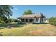 Quaint one-story home with covered porch and large backyard at 243 Love St, McConnells, SC 29726