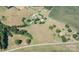 Aerial view of property showing house, sheds and large lot at 243 Love St, McConnells, SC 29726
