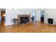 Living room with hardwood floors, brick fireplace and built-ins at 243 Love St, McConnells, SC 29726