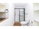 Clean bathroom with a shower/tub combo and updated vanity at 243 Love St, McConnells, SC 29726