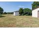 Small wooden shed in grassy backyard next to home at 243 Love St, McConnells, SC 29726