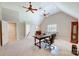 Spacious office with built-in shelving and high ceilings at 633 Peace Haven Rd, Kannapolis, NC 28083