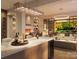 Modern kitchen with island, wine storage, and view to backyard at 409 Queens Rd # 403, Charlotte, NC 28207