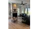 Spacious living room with fireplace, hardwood floors, and large windows at 1529 Beckwith Pl, Charlotte, NC 28205