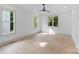 Spacious bedroom with light hardwood floors and large windows at 1529 Beckwith Pl, Charlotte, NC 28205
