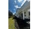 White house exterior with a front porch and a grassy backyard at 1529 Beckwith Pl, Charlotte, NC 28205