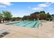 Community swimming pool with lounge chairs and basketball at 00 Rivendell Rd # 7, Denver, NC 28037