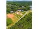 Aerial view of a lakefront community featuring luxurious homes and undeveloped land at 00 Rivendell Rd # 7, Denver, NC 28037