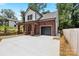 Brick two-story home with a gray door and attached garage at 4426 Pine St # 74, Kannapolis, NC 28081