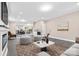 Open living room features a fireplace and flows into the kitchen and dining area at 4426 Pine St # 74, Kannapolis, NC 28081
