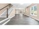 Modern staircase with white railing and gray flooring at 4426 Pine St # 74, Kannapolis, NC 28081