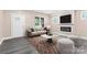 Living room with fireplace, neutral walls, and wood-look flooring at 4426 Pine St # 74, Kannapolis, NC 28081