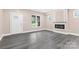Living area with fireplace, neutral walls, and gray flooring at 4426 Pine St # 74, Kannapolis, NC 28081