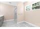 Bathroom with a walk-in shower and grey tile floors at 4426 Pine St # 74, Kannapolis, NC 28081