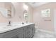 Modern bathroom with double vanity and grey cabinets at 4426 Pine St # 74, Kannapolis, NC 28081