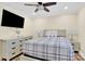 Bedroom with a large TV and a dresser at 919 Edgemont Ave, Belmont, NC 28012