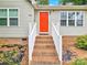 Steps leading to a red front door at 919 Edgemont Ave, Belmont, NC 28012