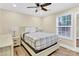Bedroom with a full bed, nightstand and ceiling fan at 919 Edgemont Ave, Belmont, NC 28012