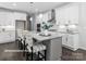 Modern kitchen with white cabinets, granite countertops, and stainless steel appliances at 10619 Audubon Ridge Dr # 24, Cornelius, NC 28031