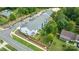Aerial view of townhouses, street, and neighboring properties at 10619 Audubon Ridge Dr # 24, Cornelius, NC 28031