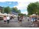 Vibrant town square with farmers market and shops at 10619 Audubon Ridge Dr # 24, Cornelius, NC 28031
