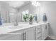 Double vanity bathroom with modern finishes and large mirror at 10619 Audubon Ridge Dr # 24, Cornelius, NC 28031
