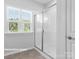 Bright bathroom featuring a large shower and window at 10611 Audubon Ridge Dr # 26, Cornelius, NC 28031