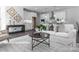 Bright living room with a large window and comfortable seating at 10611 Audubon Ridge Dr # 26, Cornelius, NC 28031