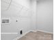 Laundry room with shelving and built-in storage at 10611 Audubon Ridge Dr # 26, Cornelius, NC 28031