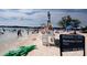 Sandy beach with lifeguard and swimming people at 10611 Audubon Ridge Dr # 26, Cornelius, NC 28031