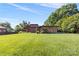Brick ranch house with a modern design and landscaping at 640 Davie Ave, Statesville, NC 28677