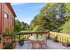 Deck with a glass-top table and chairs, offering a view of the backyard at 640 Davie Ave, Statesville, NC 28677