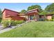 Mid-century modern home with red brick and landscaping at 640 Davie Ave, Statesville, NC 28677