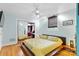 Bedroom with platform bed, wood floors, and mirrored closet at 640 Davie Ave, Statesville, NC 28677