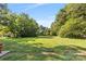 Expansive grassy backyard, providing ample space and privacy at 640 Davie Ave, Statesville, NC 28677