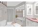 Spa-like bathroom featuring a large soaking tub and double vanity at 640 Davie Ave, Statesville, NC 28677