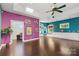 Colorful game room with hardwood floors and built-in shelving at 640 Davie Ave, Statesville, NC 28677