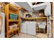 Basement laundry room with washer, dryer, and utility sink at 640 Davie Ave, Statesville, NC 28677