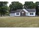 Ranch home with attached garage and large grassy yard at 1217 Tom Joye Rd, Clover, SC 29710