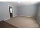 Spacious living room with new carpet and fresh paint at 410 Clinton Dr, Kings Mountain, NC 28086