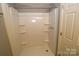 Updated shower with a new shower surround and shelves at 410 Clinton Dr, Kings Mountain, NC 28086