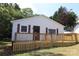 White house with wooden ramp and deck at 410 Clinton Dr, Kings Mountain, NC 28086