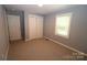 Bright bedroom featuring a double closet and window at 410 Clinton Dr, Kings Mountain, NC 28086