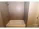 Clean bathroom with a shower/tub combo at 410 Clinton Dr, Kings Mountain, NC 28086