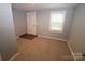 Versatile room with tile entryway and carpet flooring at 410 Clinton Dr, Kings Mountain, NC 28086